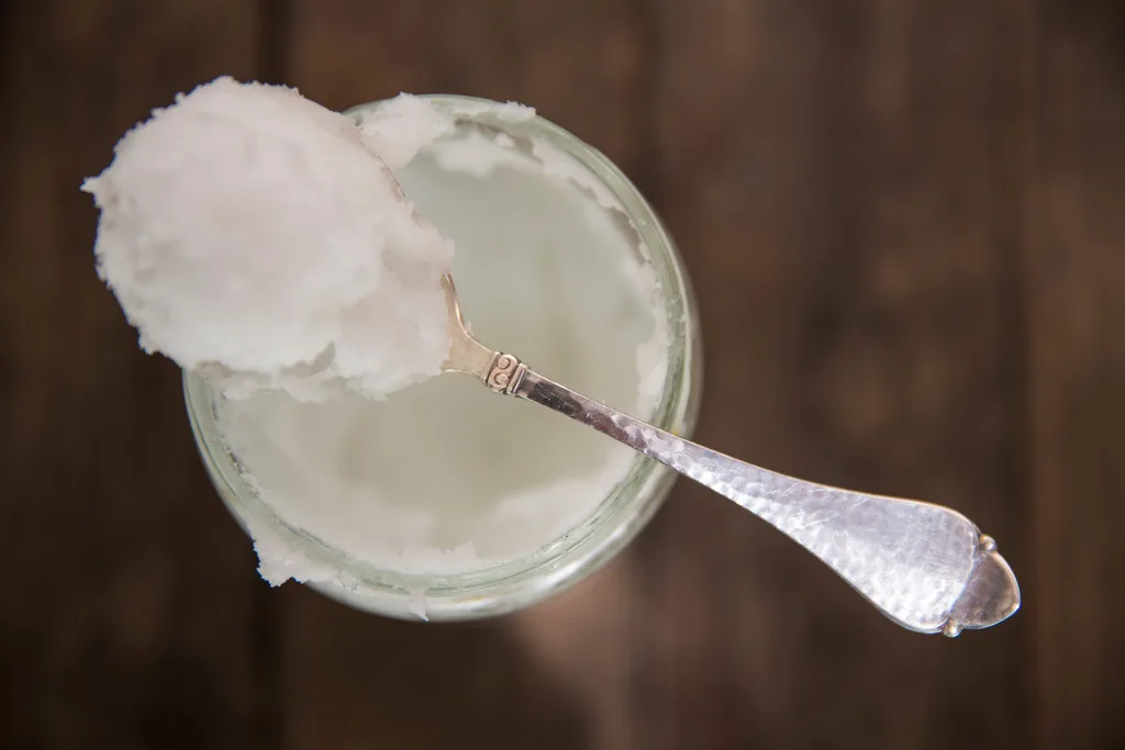A scoop of coconut oil on a spoon