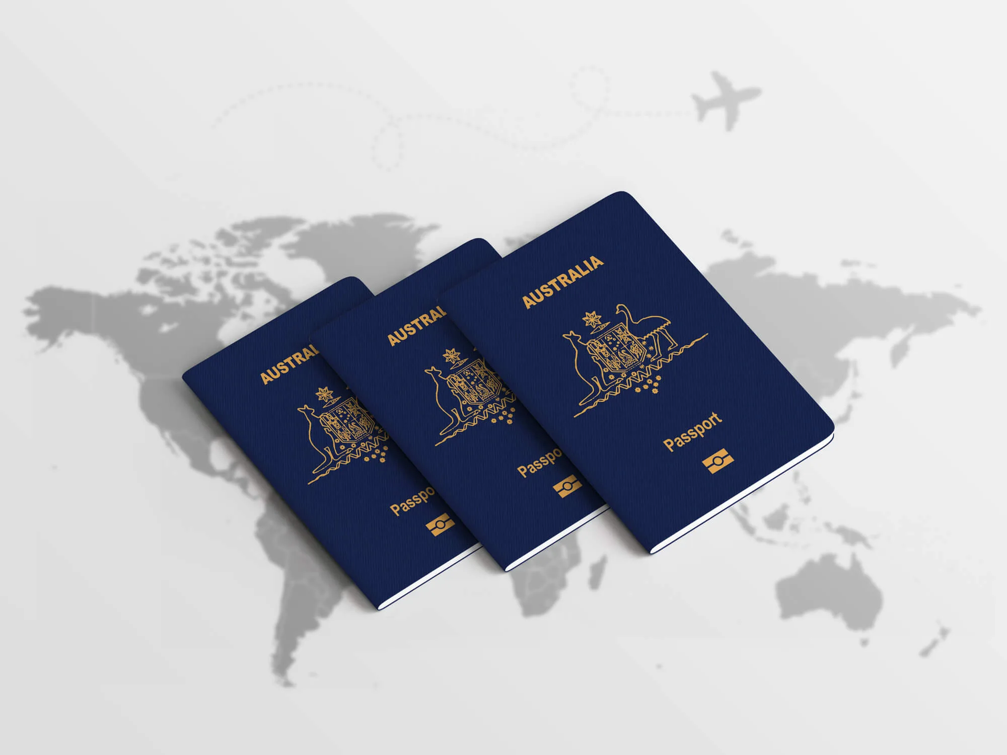Three passports lying on a world map