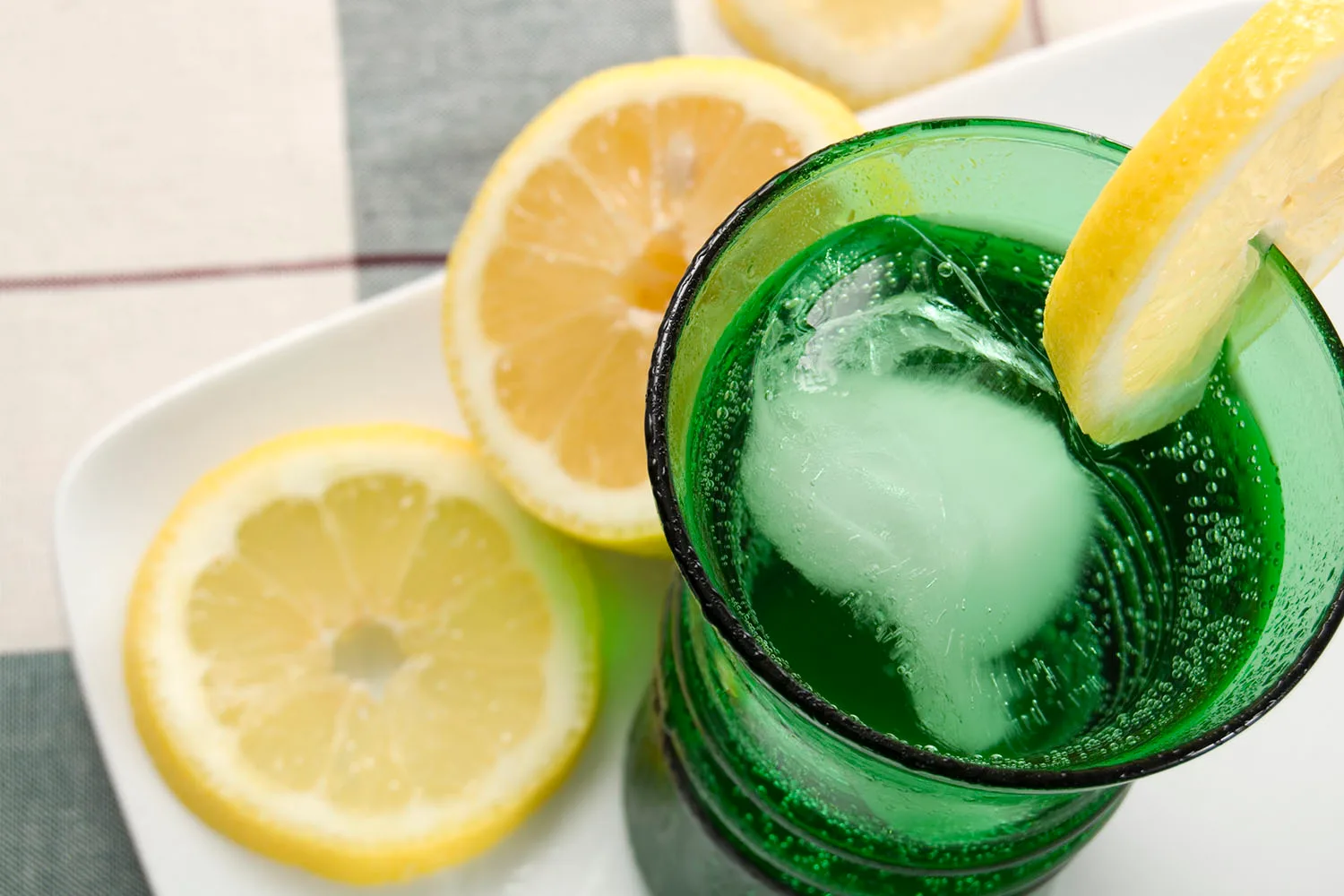 glass of water with slices of lemon