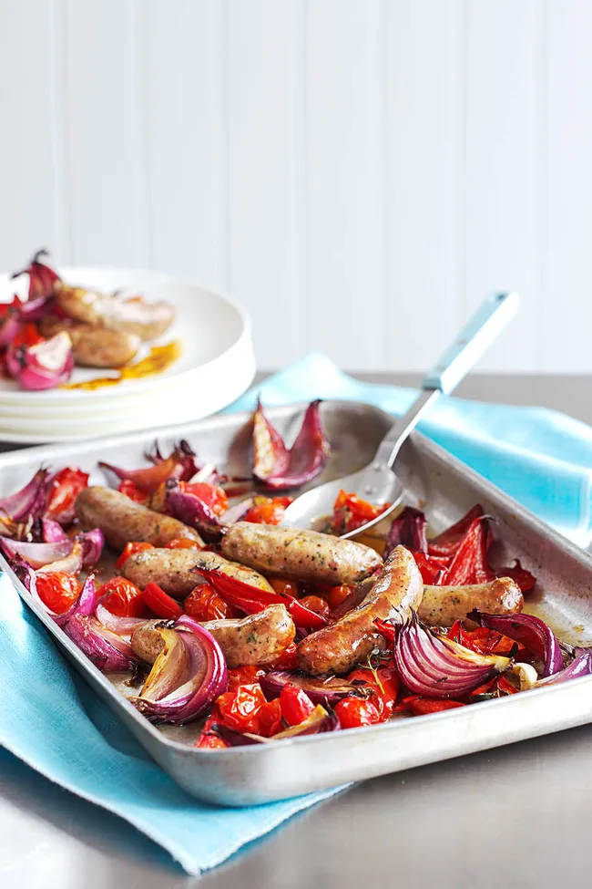 Balsamic roasted sausages with red vegetables
