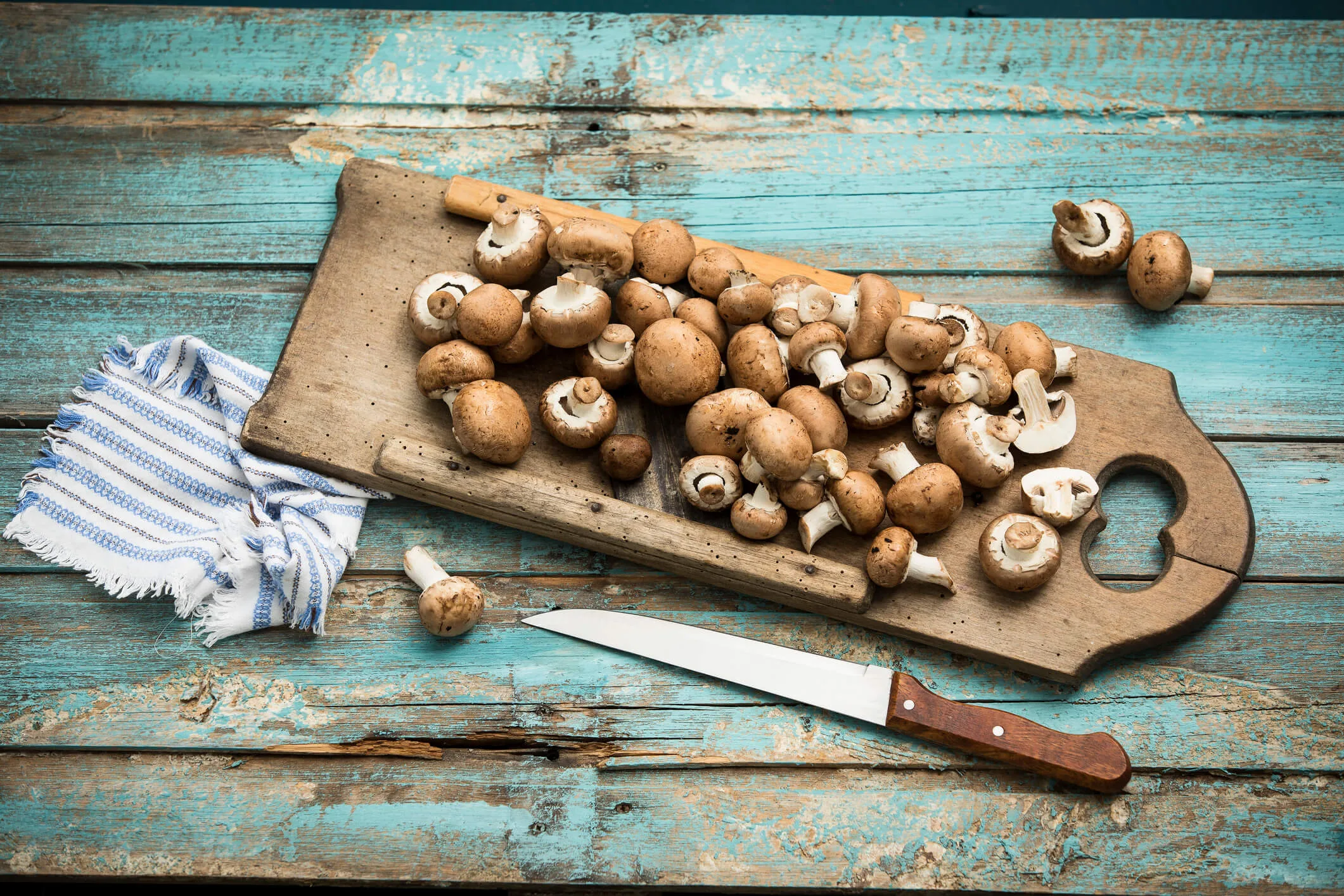 Mushrooms on a wooden chopping board
