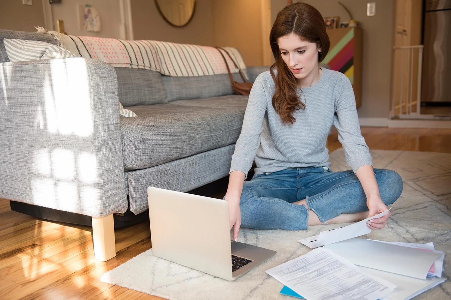 woman looking at laptop