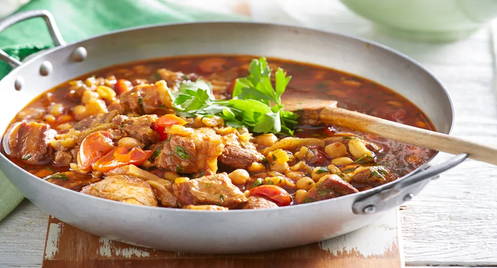 Camp oven pork with peanuts and smoky tomato sauce - Better Homes & Gardens Australia