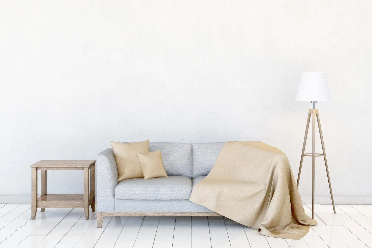 grey sofa with yellow throw blanket over arms and cushions