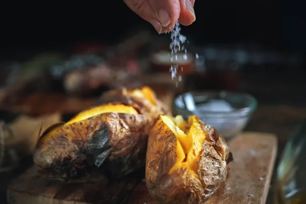 A roasted potato with salt