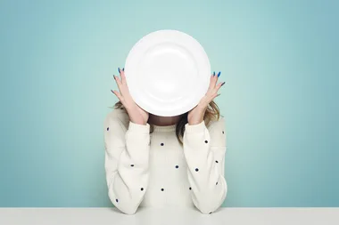 Woman holding plate