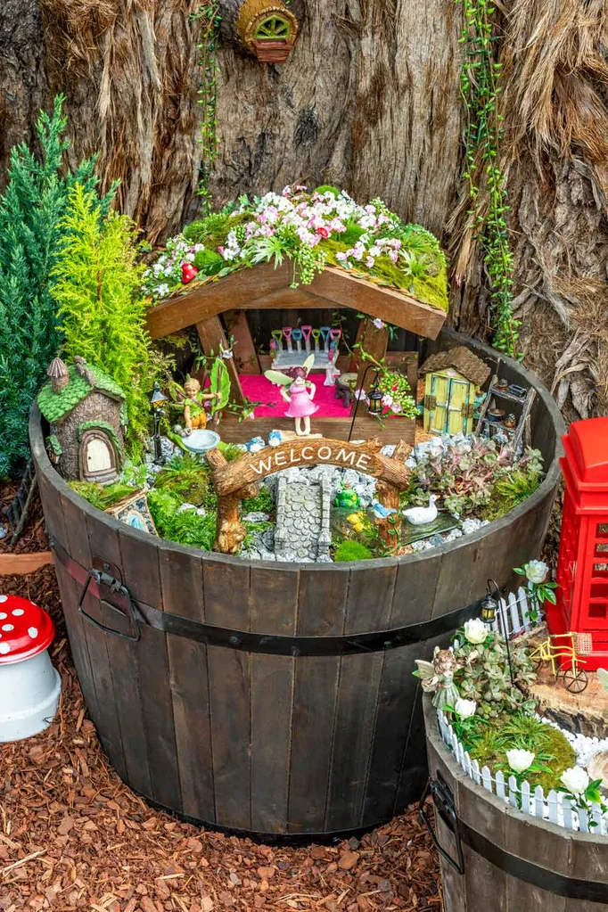 Fairy garden in a half barrel