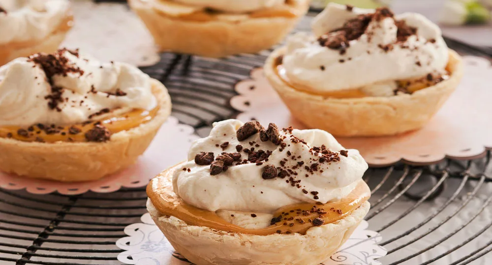 Banana toffee cream tartlets - Better Homes & Gardens Australia