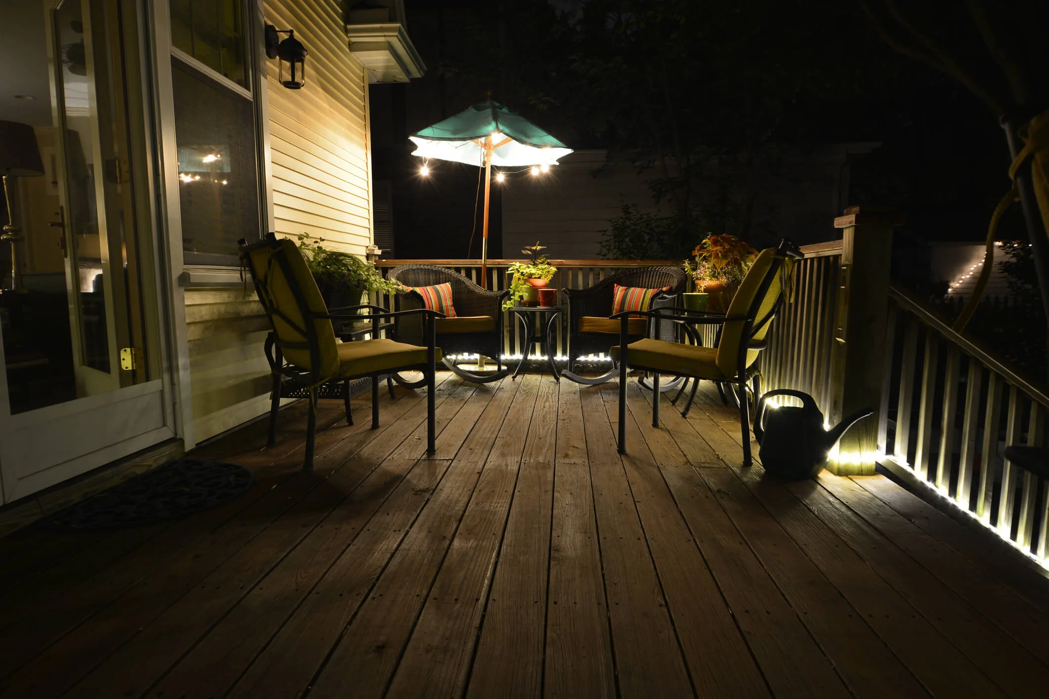 Illuminated patio furniture on a deck