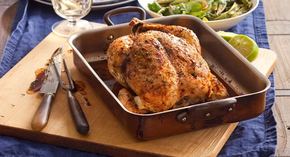 Thai-spiced chicken with coriander chilli stuffing and Asian greens