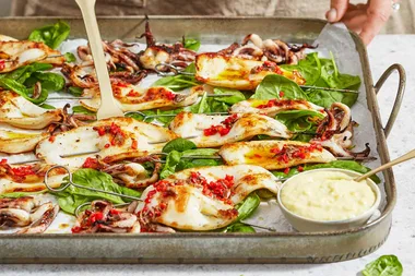 Skewered charred calamari