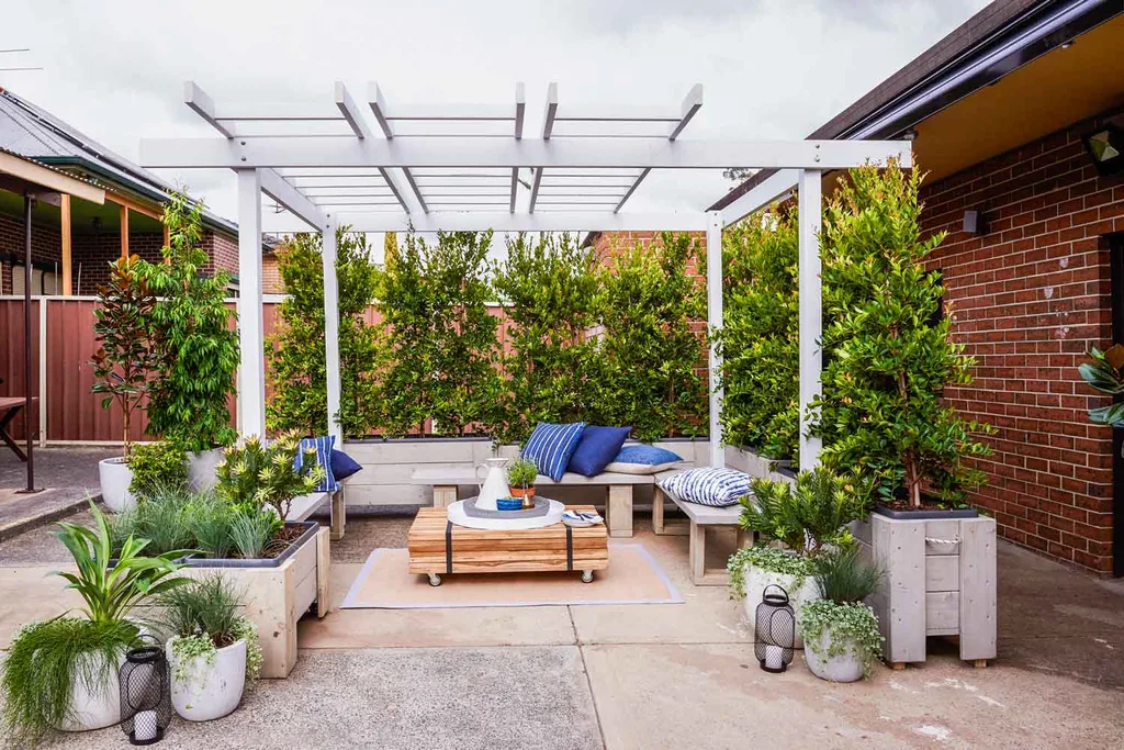 Backyard with pergola and planters