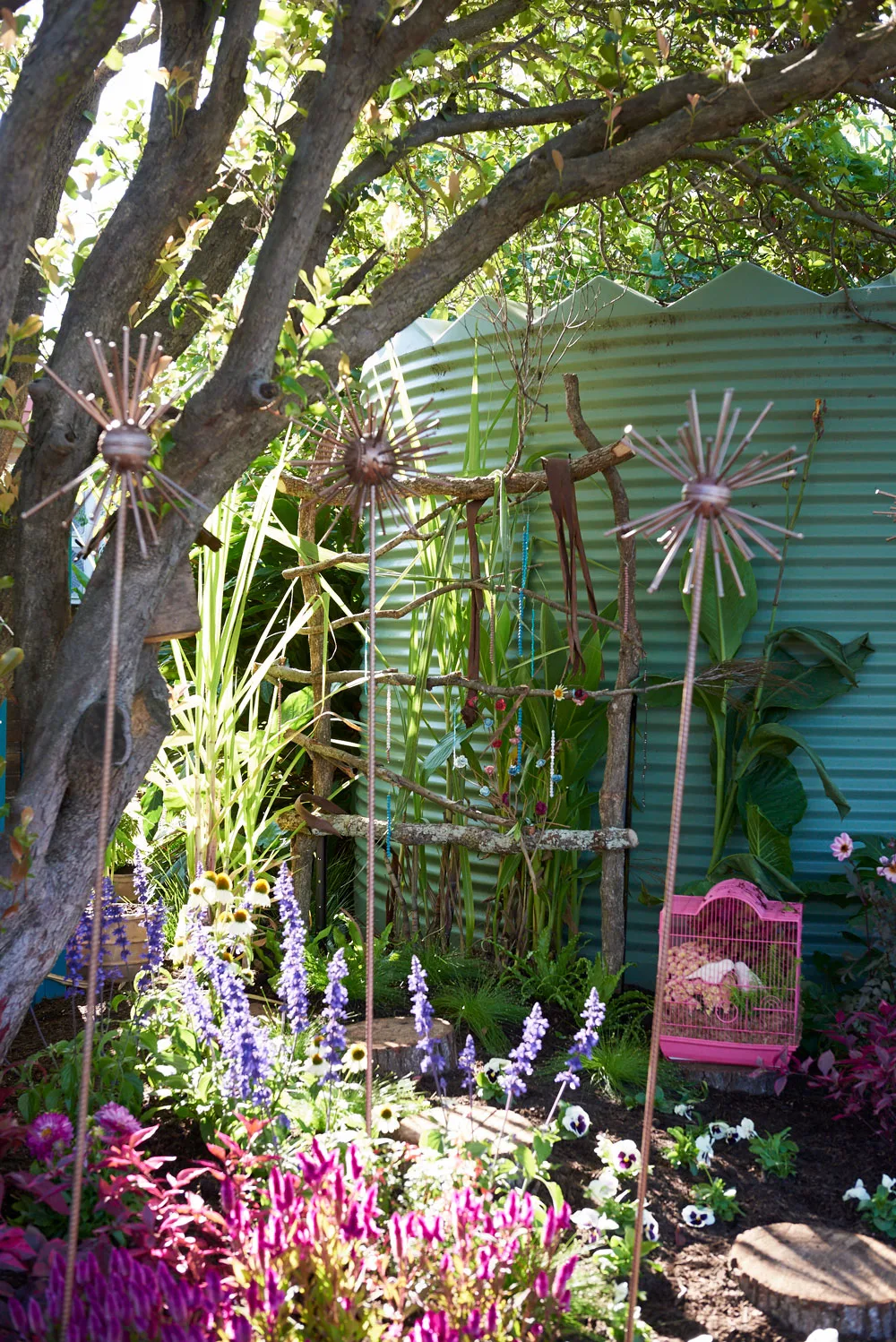 Garden art and birdcage planter