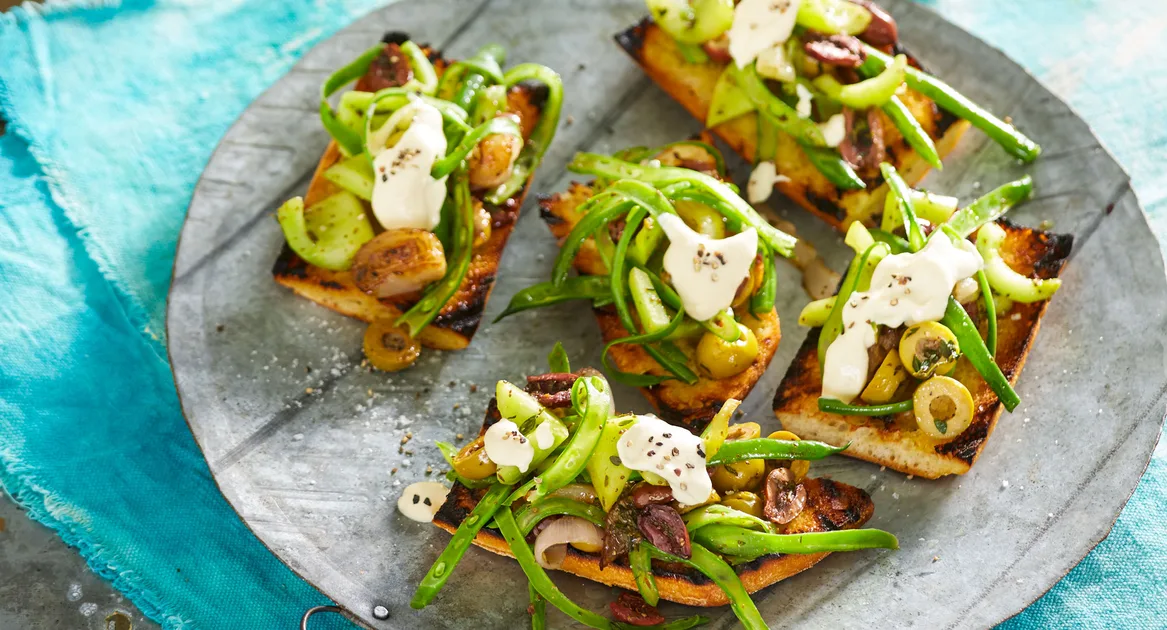 Garlic toast olive green bean salad Recipe | Better Homes & Gardens Australia