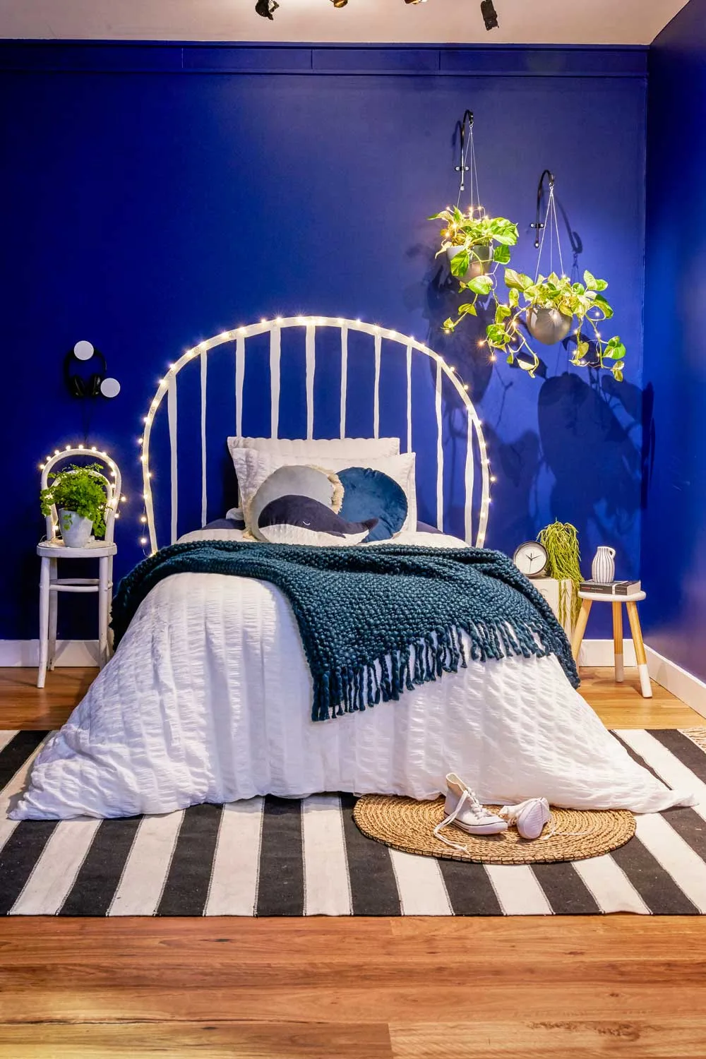 Painted bedhead with fairy lights
