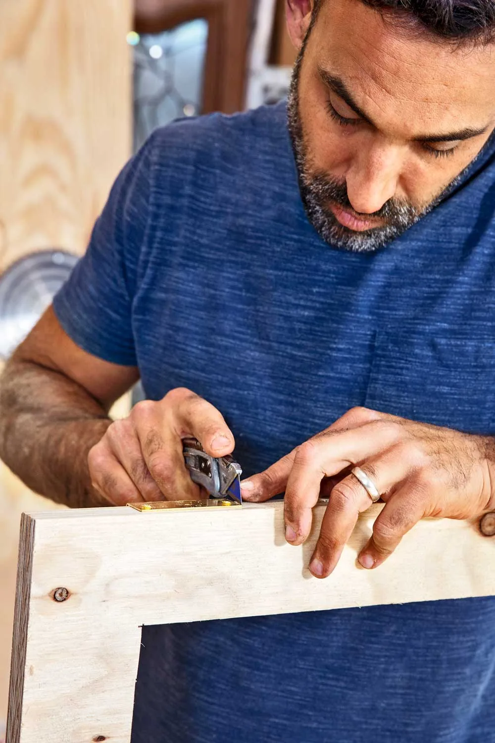 Cut around hinge with a utility knife