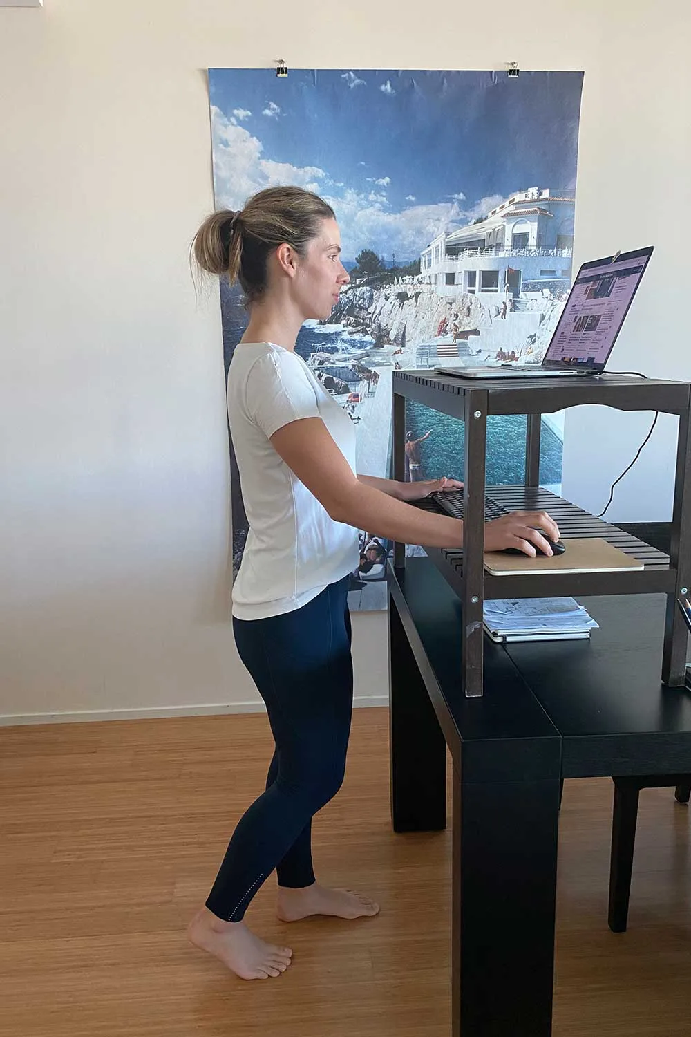 Girl standing up at desk