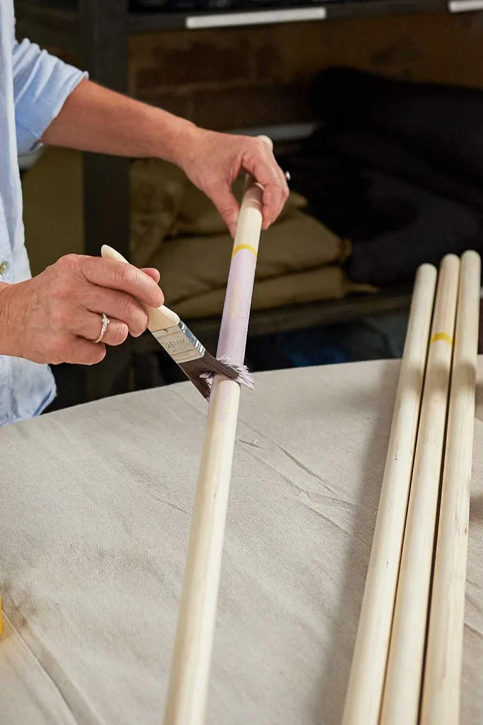 Painting timber poles