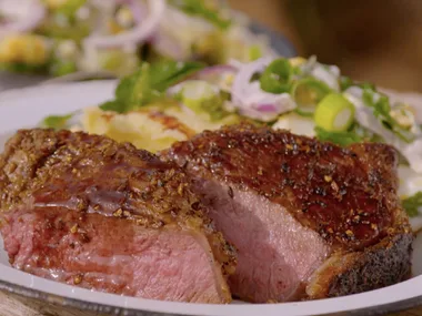 Seed-crusted striploin steak with egg salad