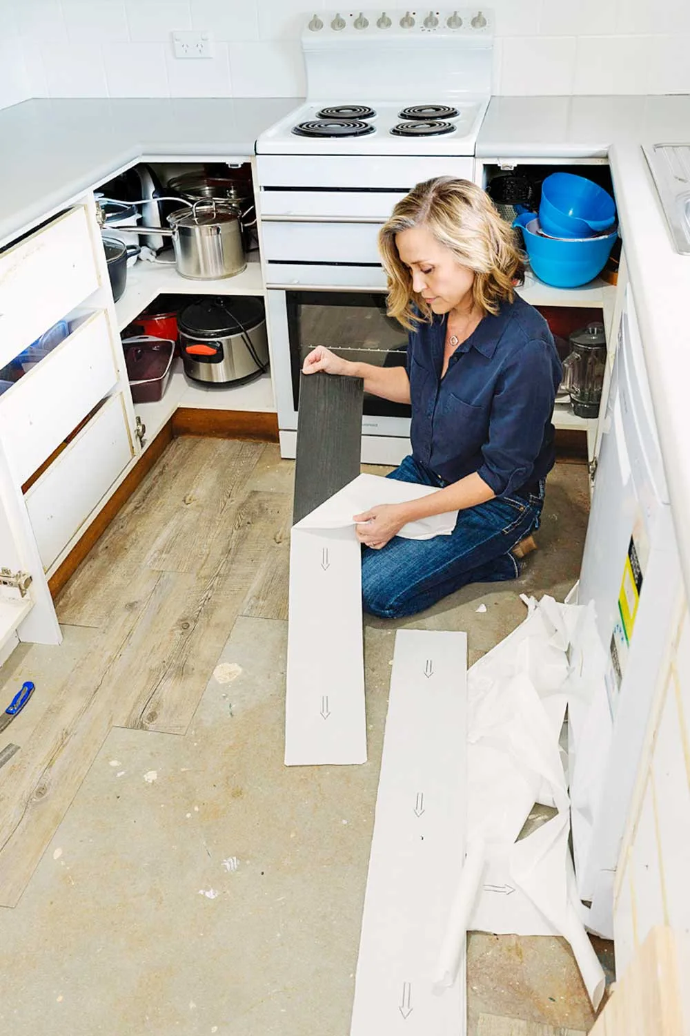Tara laying floor planks