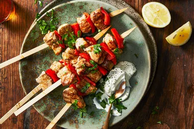 Greek-style pork and capsicum kebabs with easy walnut and goat’s cheese dolmades