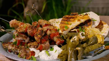 Greek-style pork and capsicum kebabs with easy walnut and goats cheese dolmades