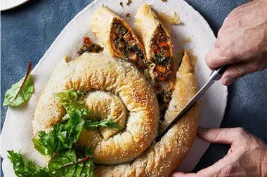 Spinach, cheese and winter vegetable pastry coil