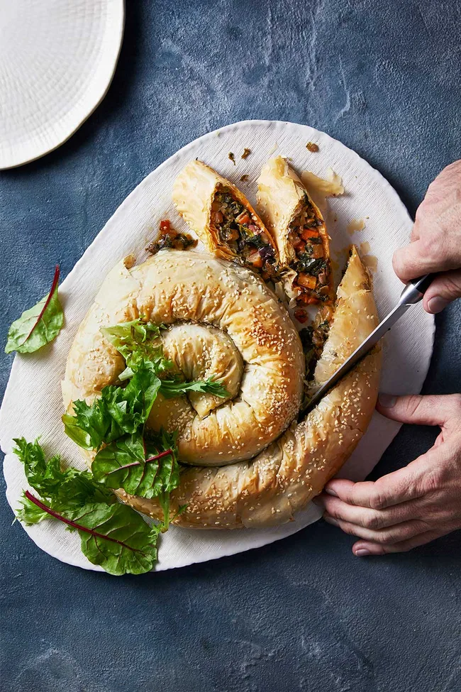 Spinach cheese and winter vegetable pastry coil
