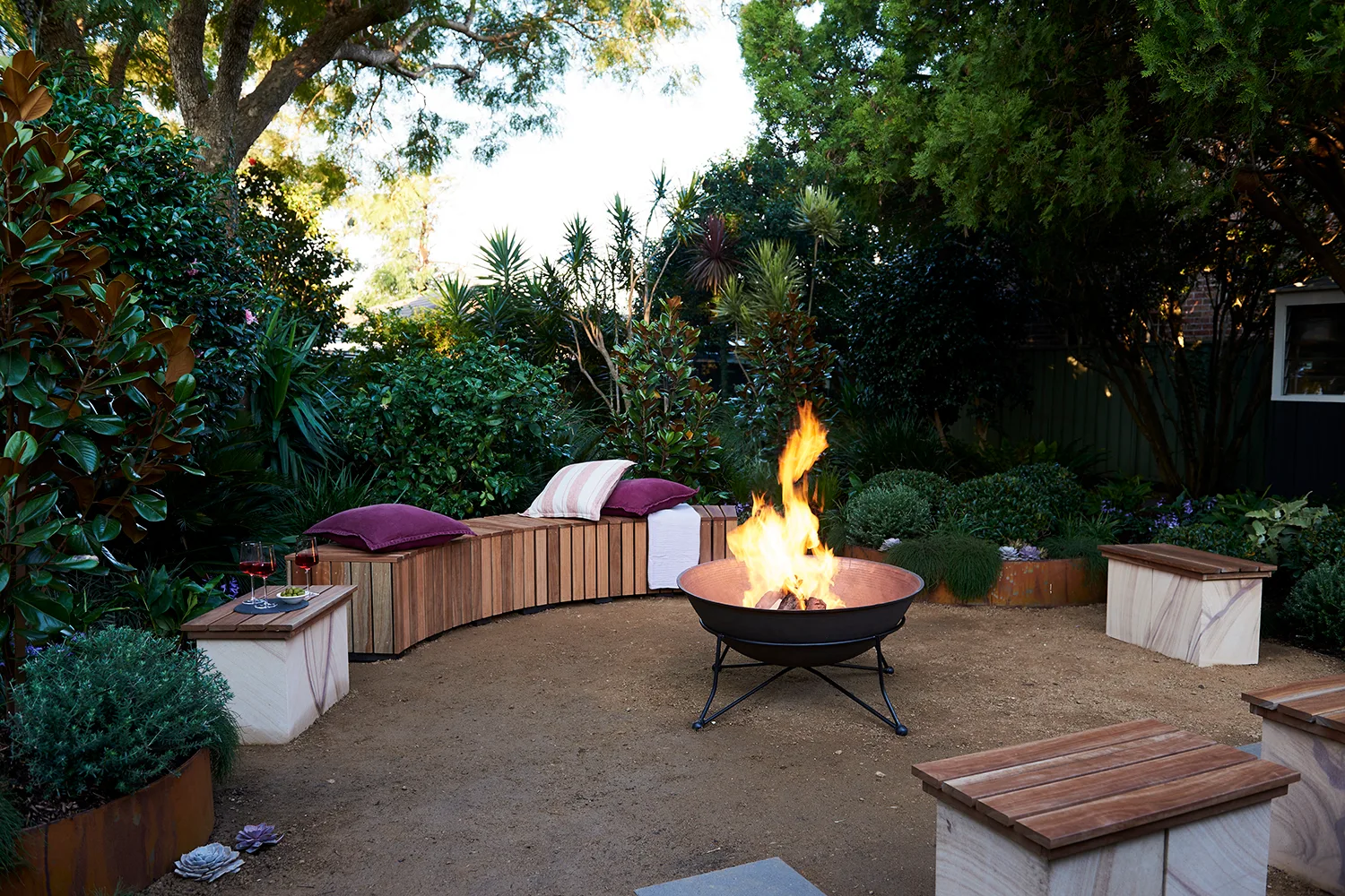 Backyard firepit with bench seats