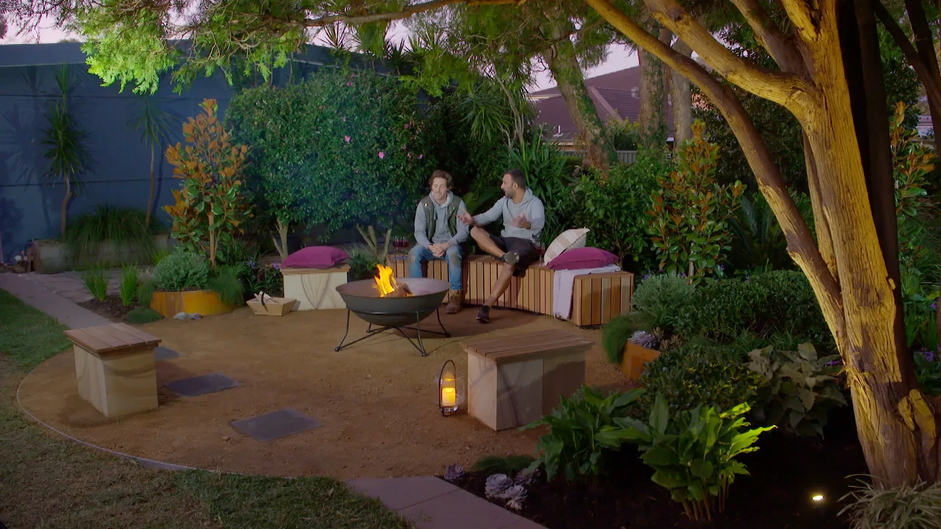 Charlie Albone and Adam Dovile make a fire pit