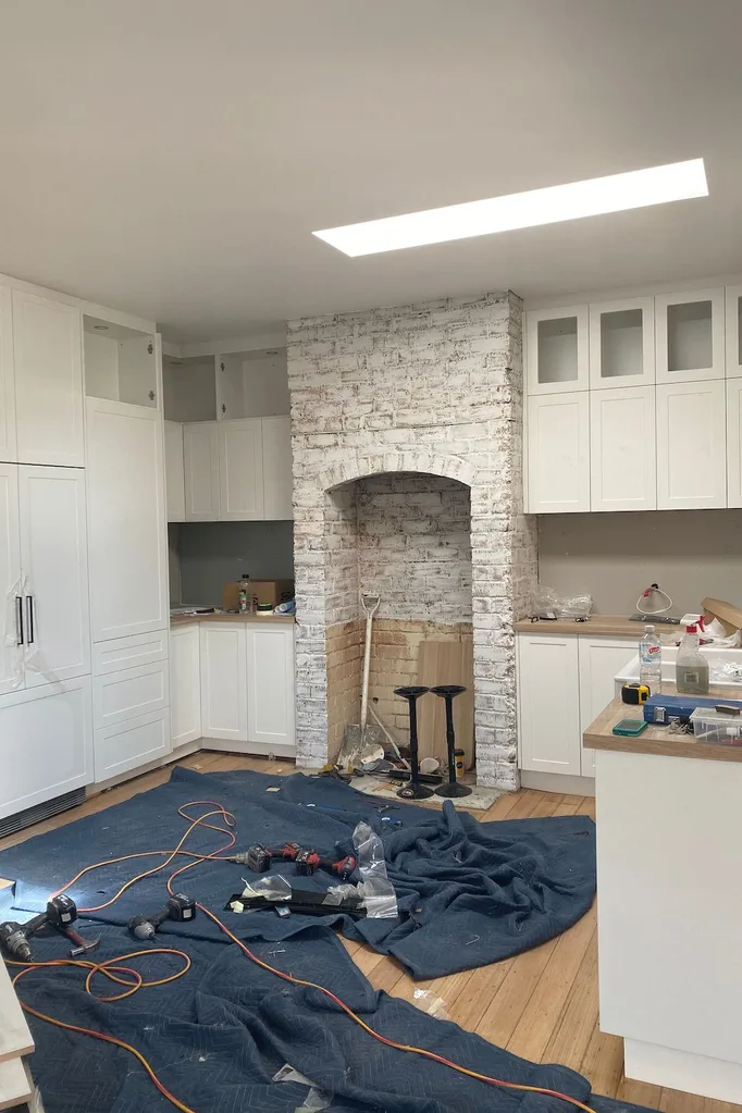 Messy kitchen being renovated