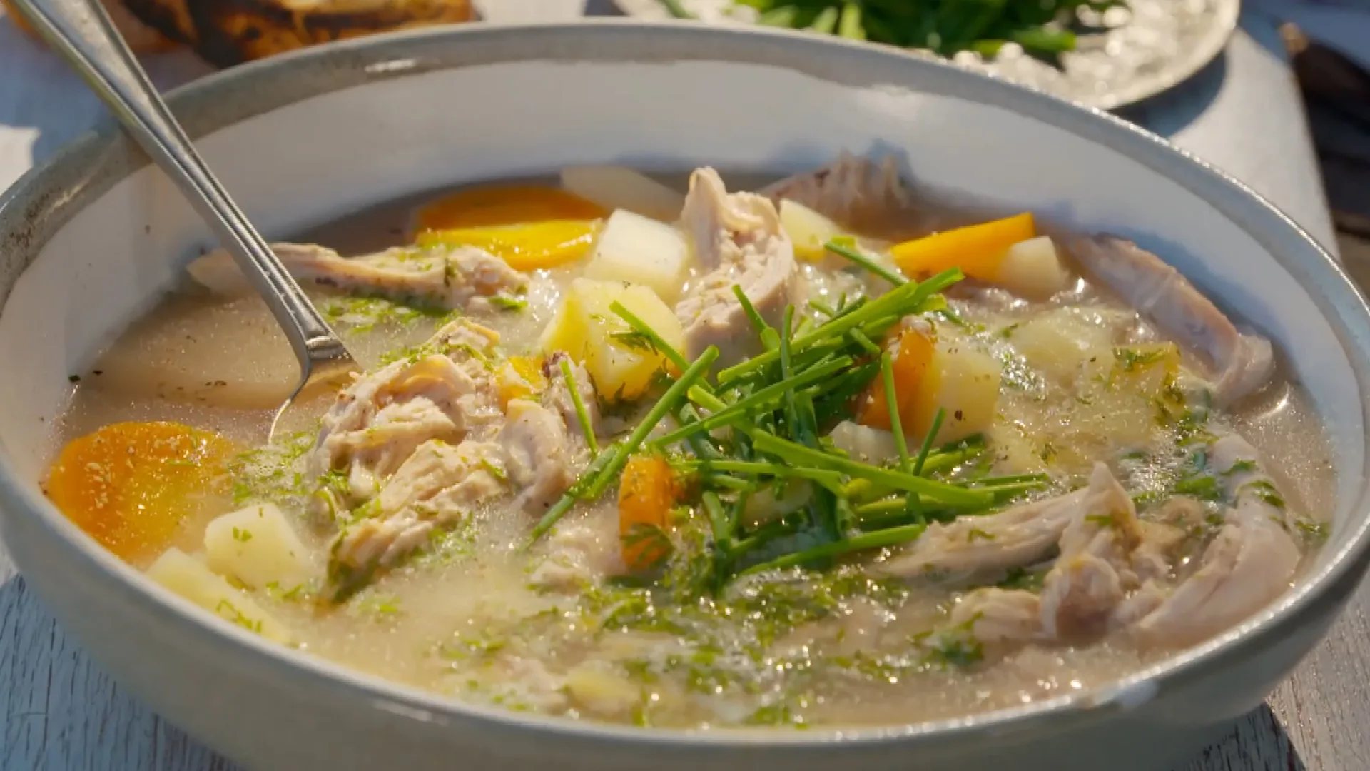 Country-style chicken soup with herbed egg drop