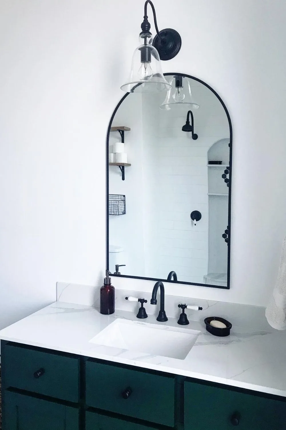 Luxe mirror and sink in bathroom