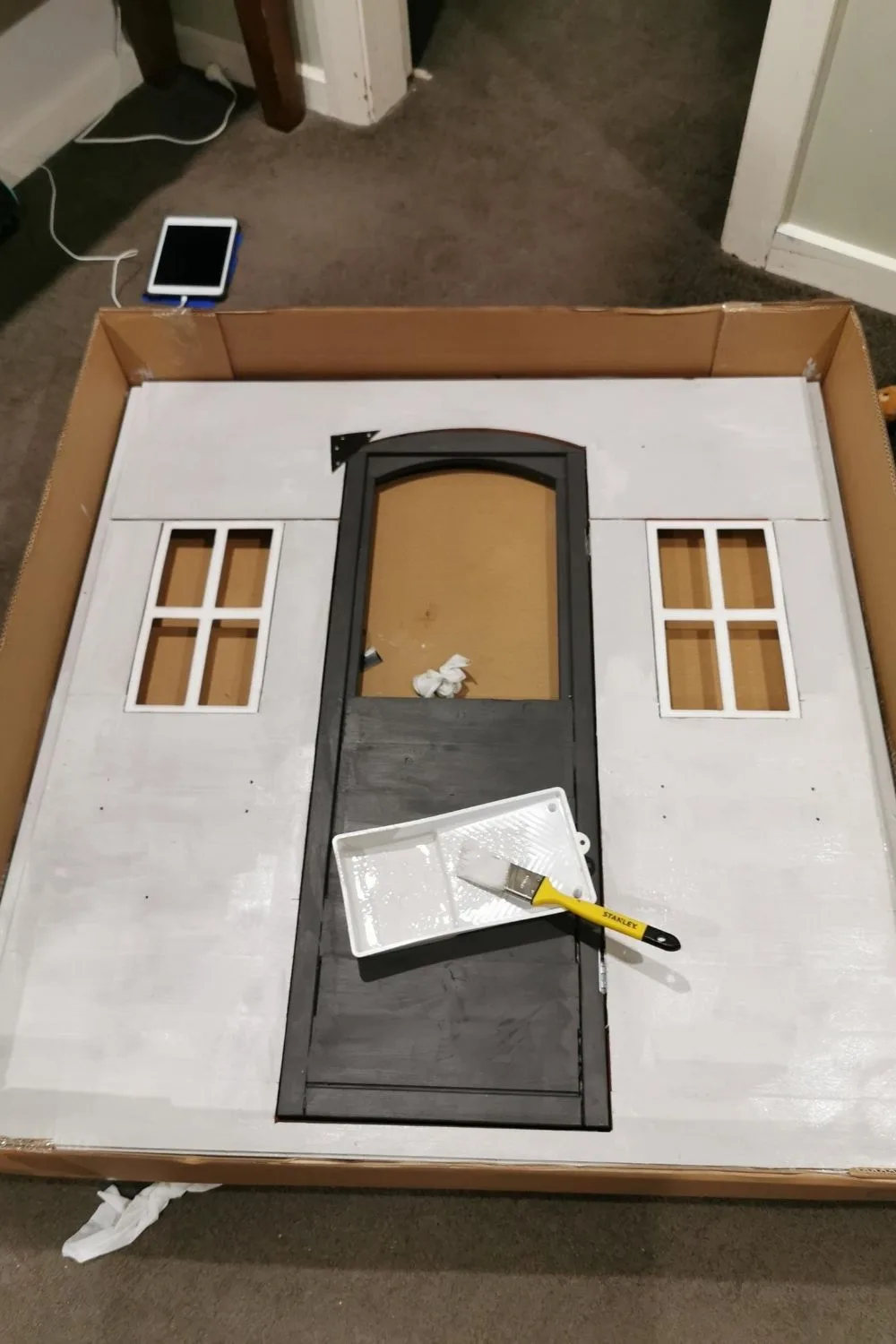 painting sanded cubby house