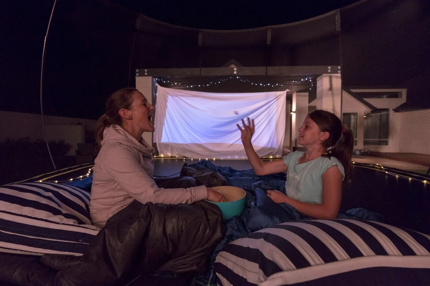 mum and daughter on trampoline