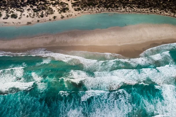birds eye view of ocean and beach