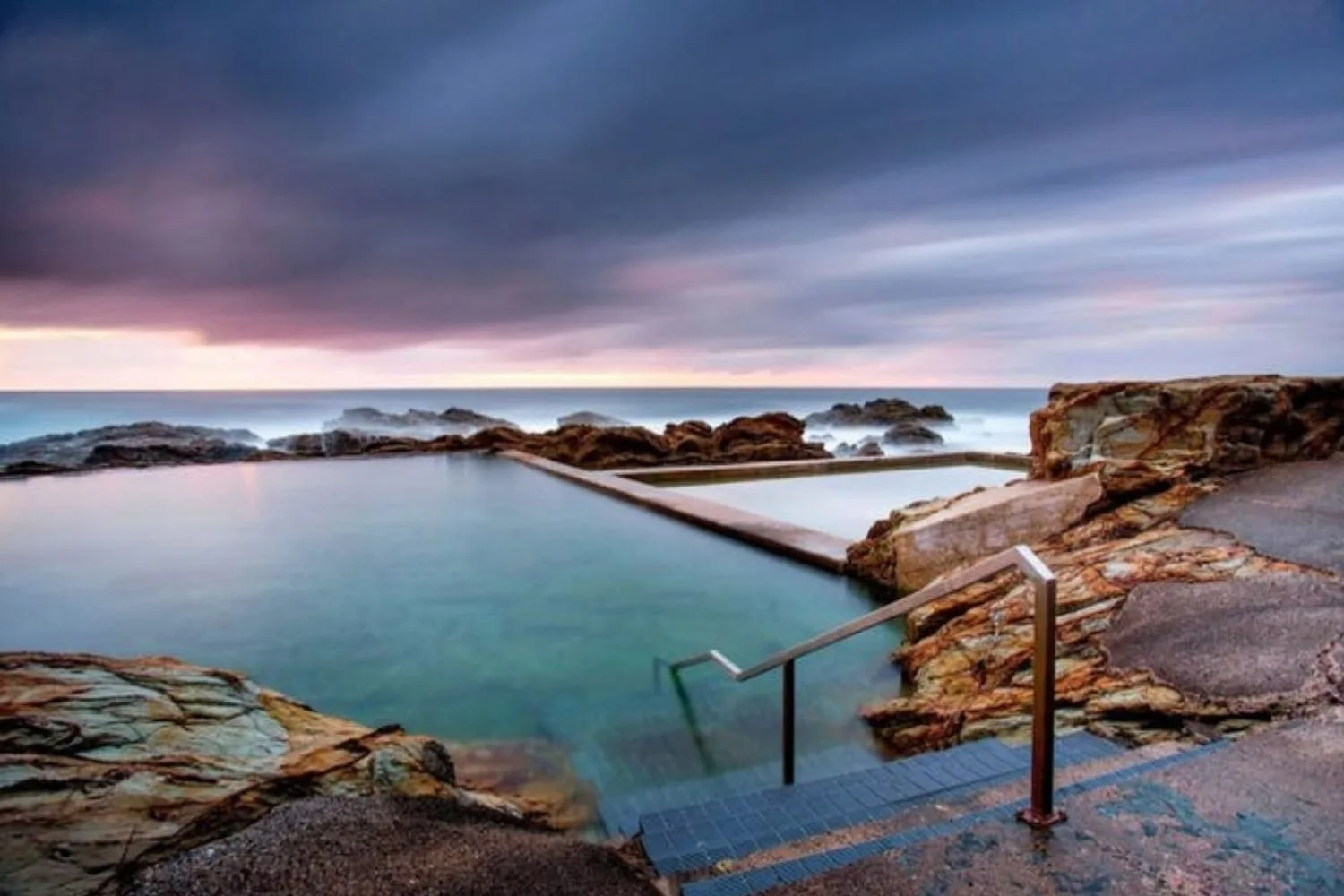 scenic ocean and pool at dawn