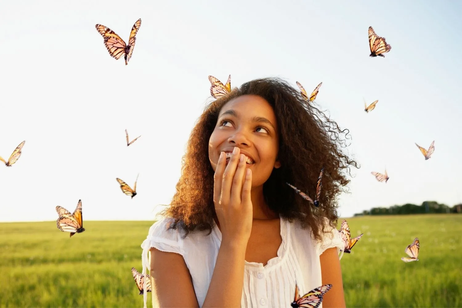 woman surrounded by butterflies
