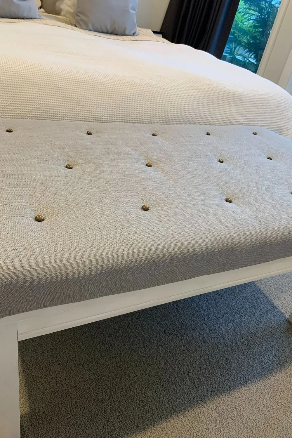 close up of material on ottoman cushion