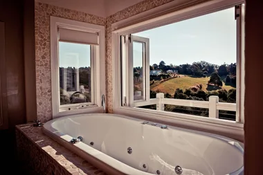 tub with a view of mountains