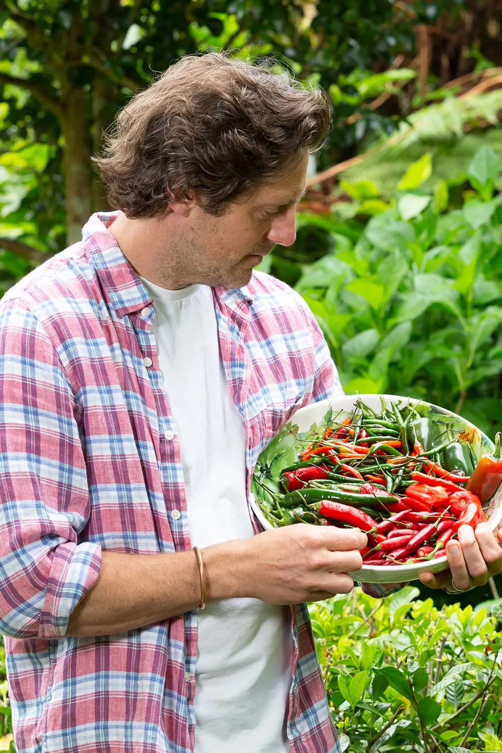 Charlie holding bowl of chilli