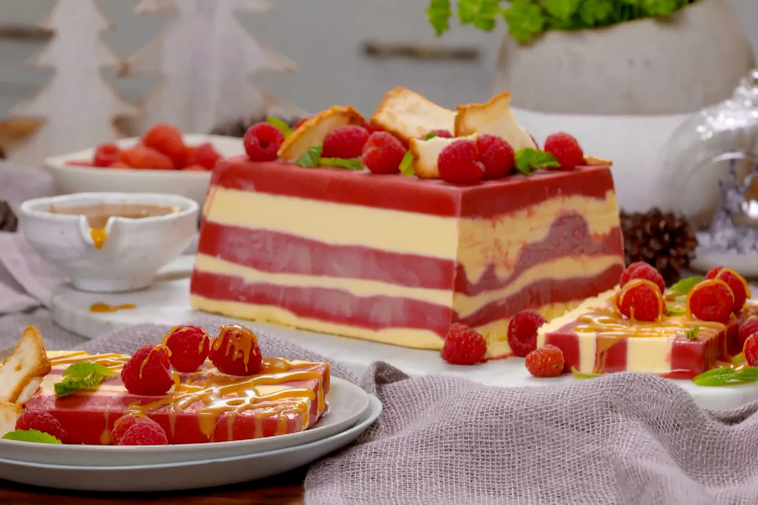 Layered vanilla and raspberry semifreddo with salted caramel vanilla sauce