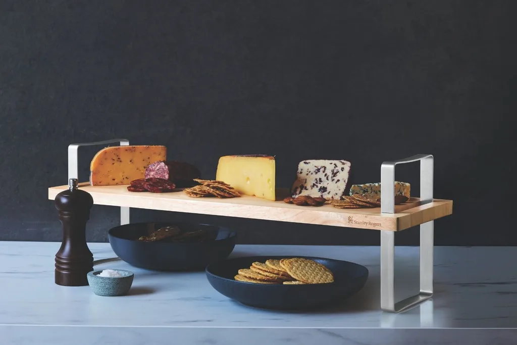Cheese board stand with cheese and crackers