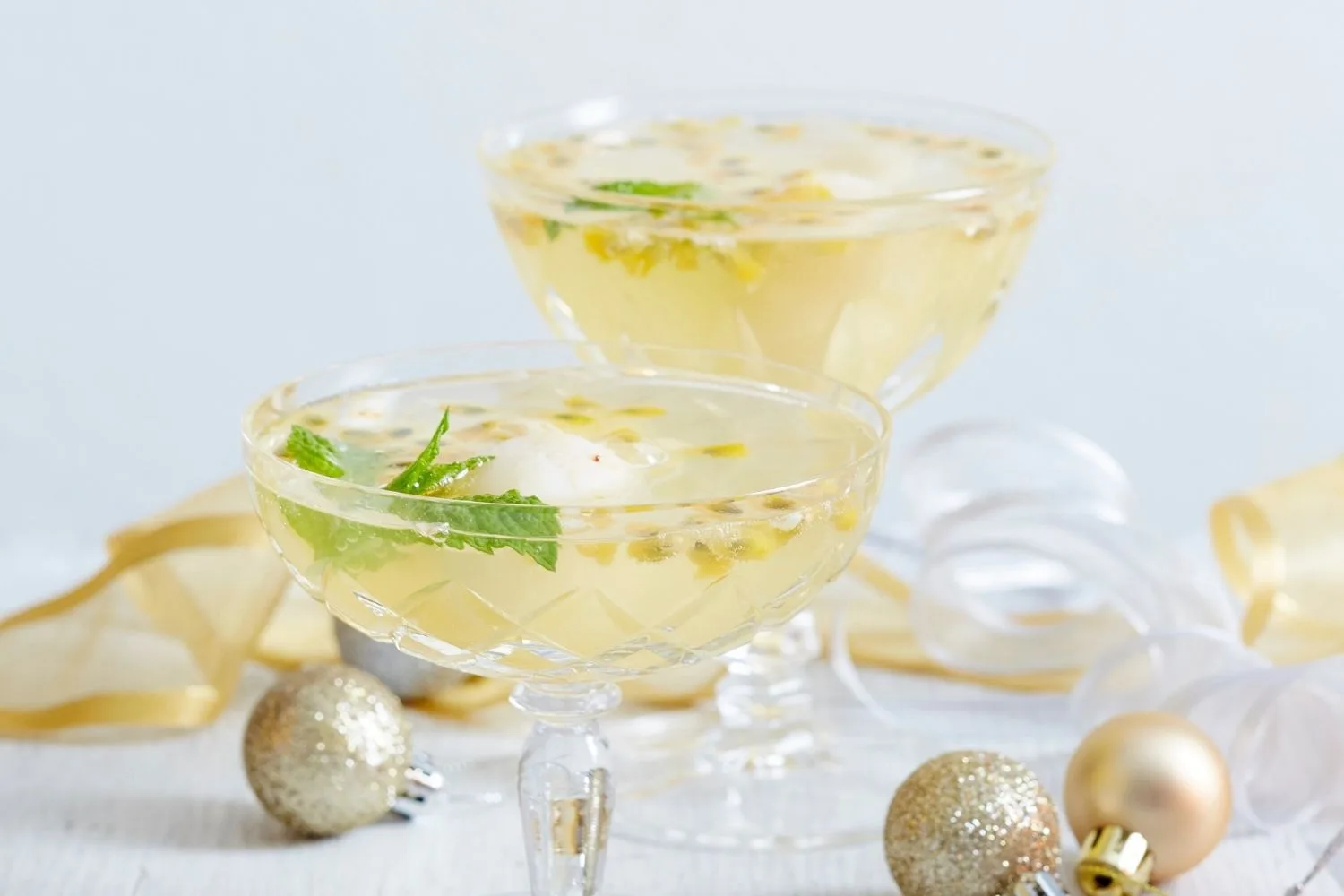 Lychee, mint and passionfruit Champagne cocktail