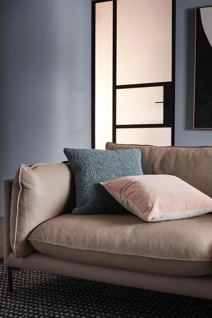 Freedom sofa with two throw cushions