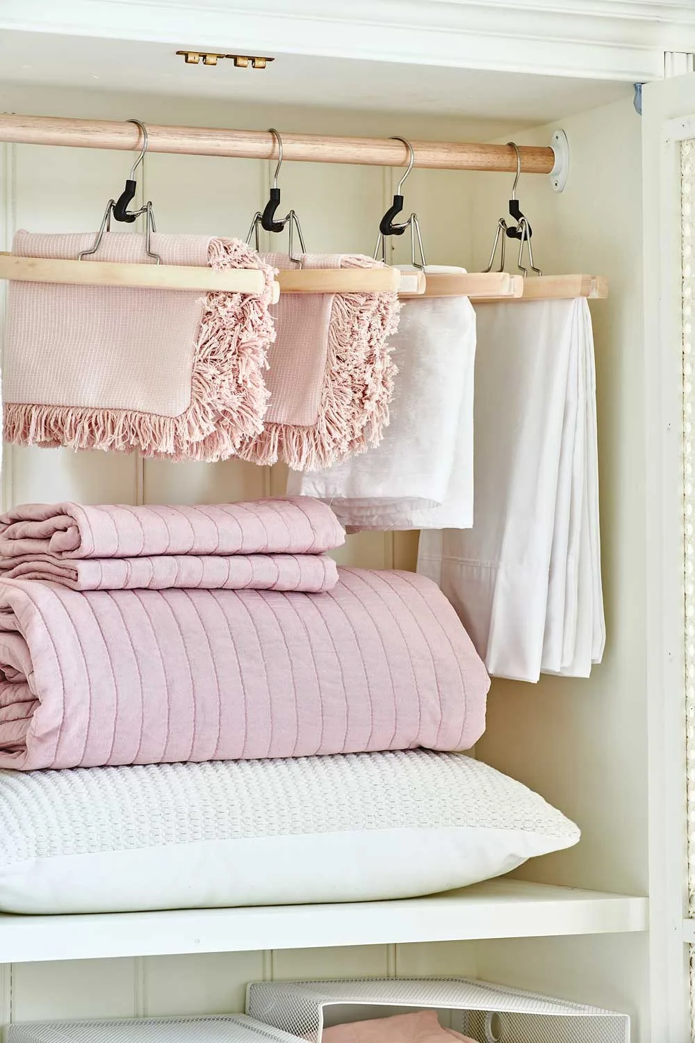 Hanging rod inside linen closet