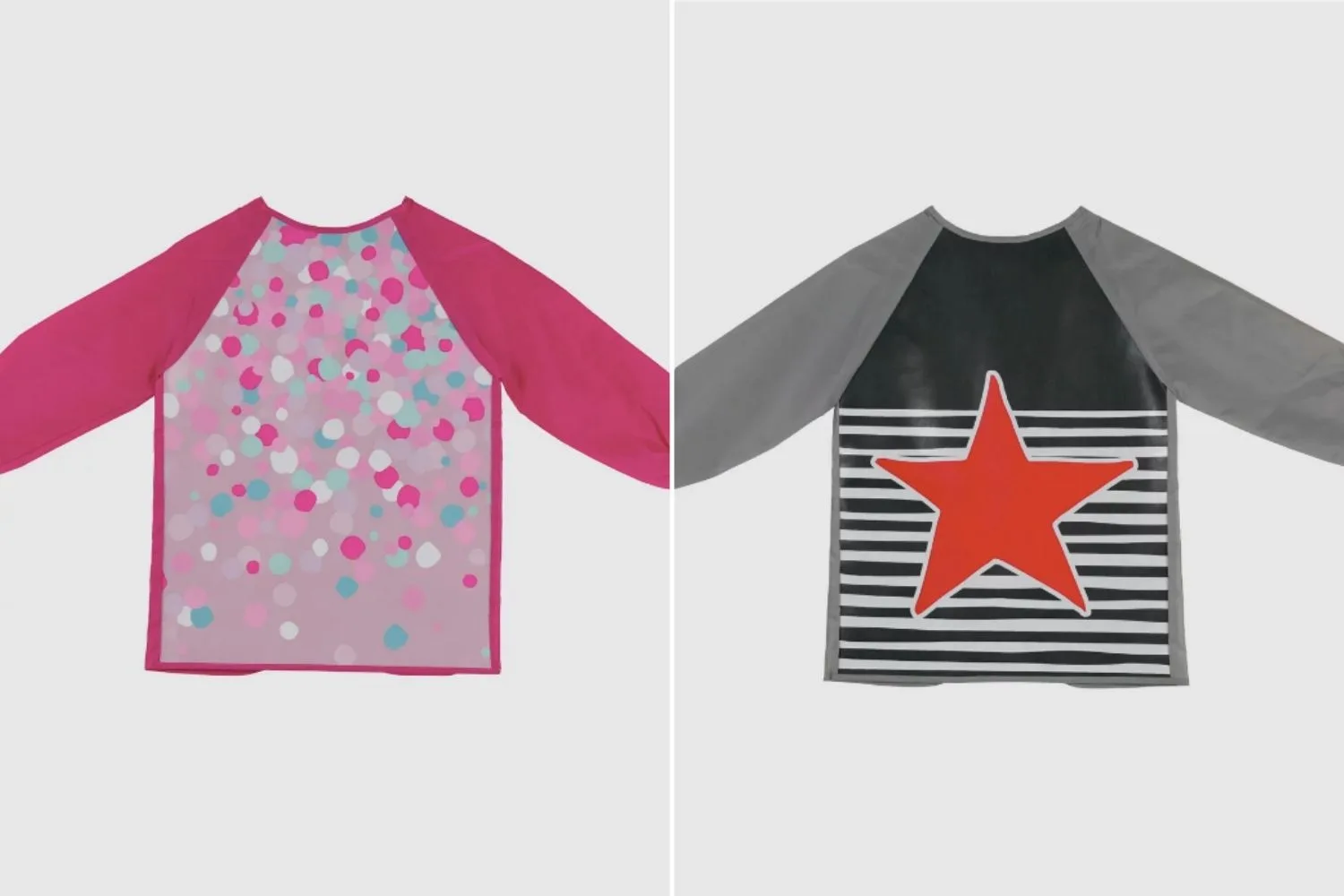 Flat lay of two art smocks, pink one on left and black one on right