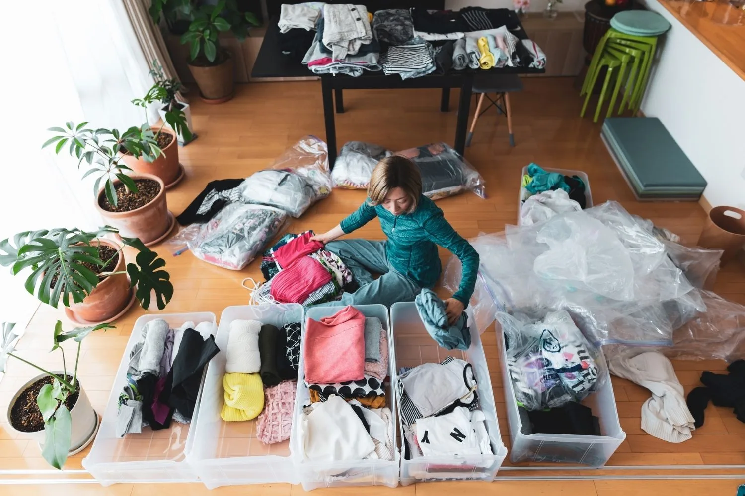 woman sorting things into boxes