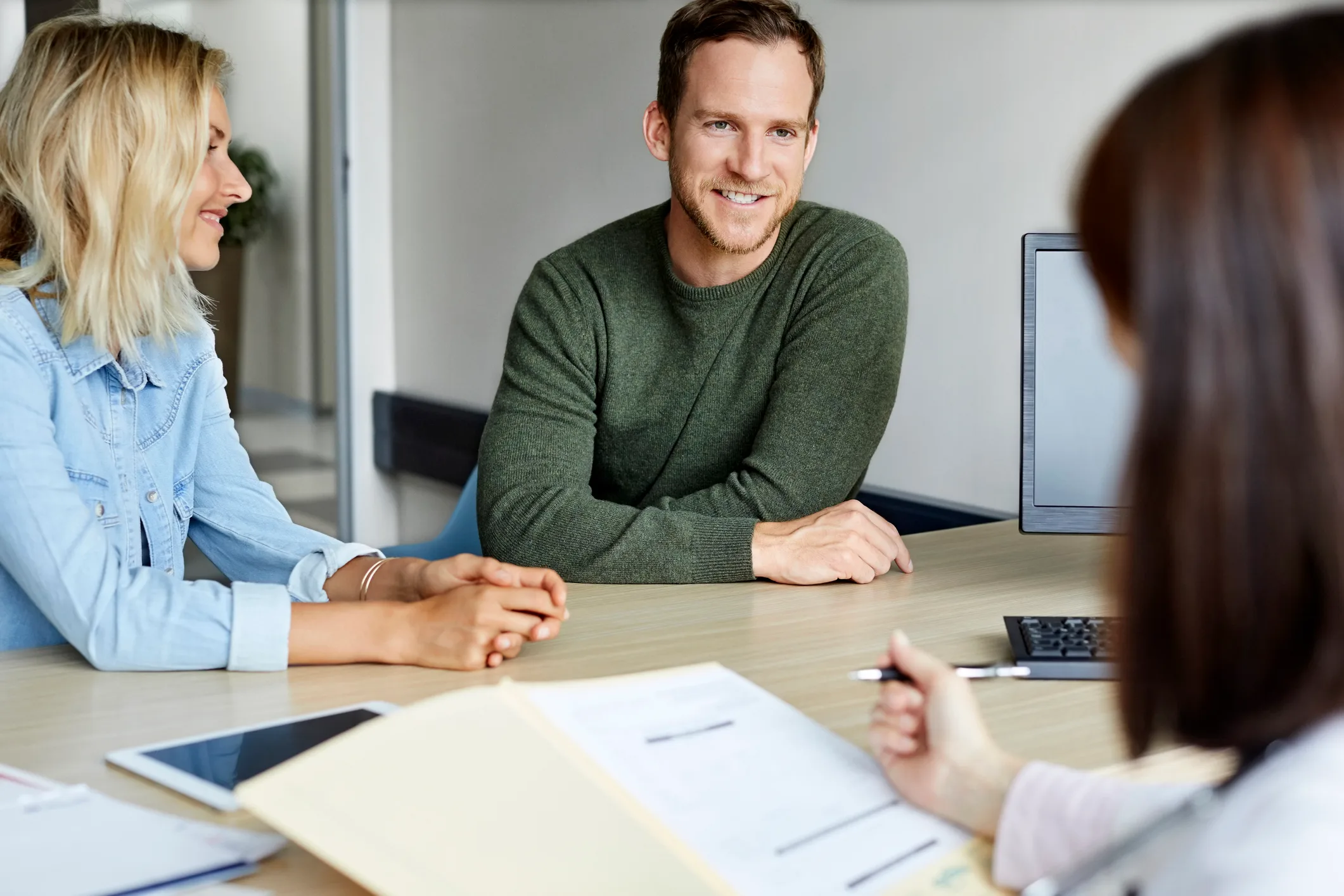 Couple meeting with a mortgage broker