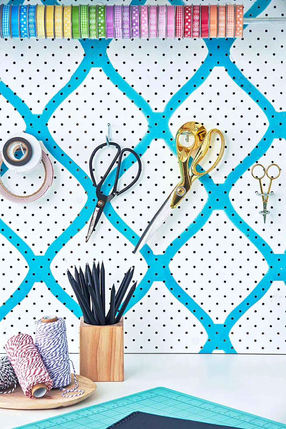 Craft room ribbon dispenser